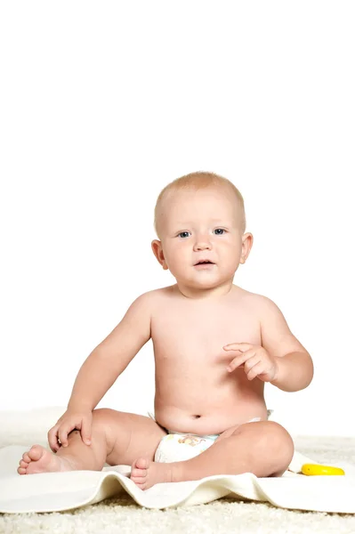 Schattige kleine jongen in pampers — Stockfoto