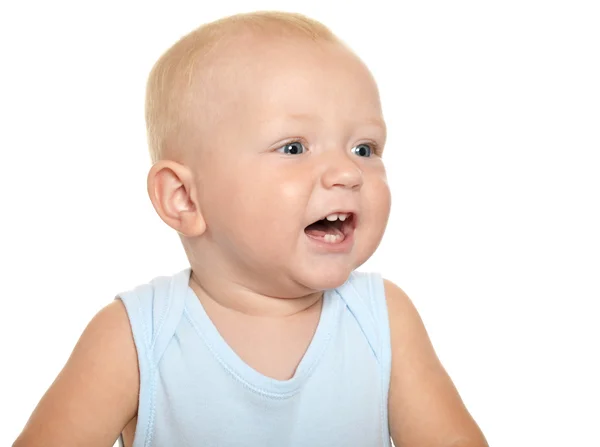 Babyjongen op zoek weg en glimlachen — Stockfoto