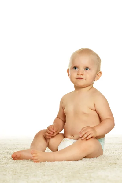 Netter kleiner Junge in Verwöhntaschen — Stockfoto