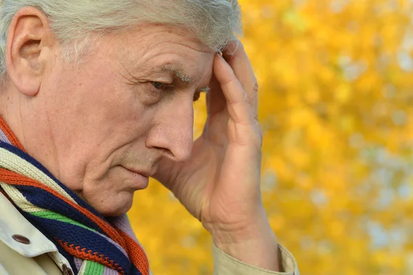 Pensive elderly man — Stock Photo, Image