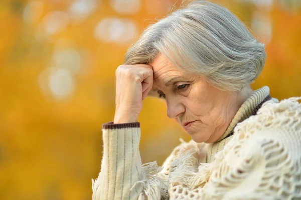 Pensive elderly woman Royalty Free Stock Images