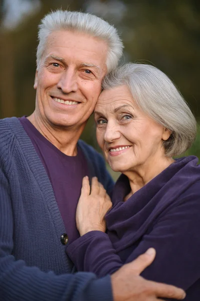 Senior couple embracing outdoors — Stock Photo, Image