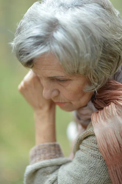 Sad senior woman — Stock Photo, Image