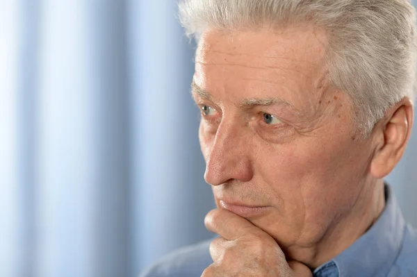 Senior man thinking about something — Stock Photo, Image