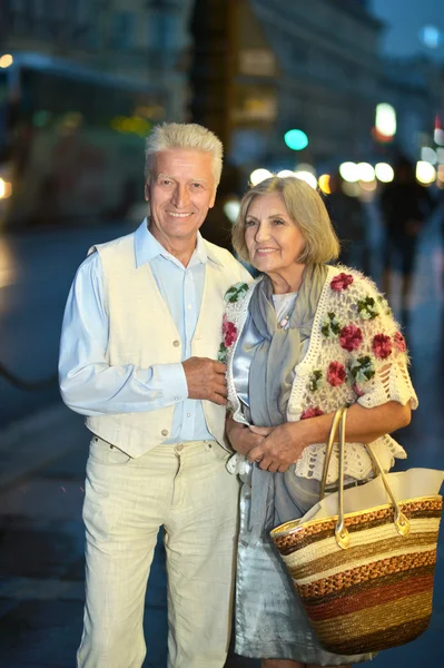 Senior couple on night street — Stock Photo, Image