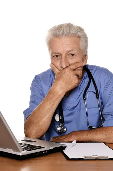 Senior positive doctor with notebook — Stock Photo, Image
