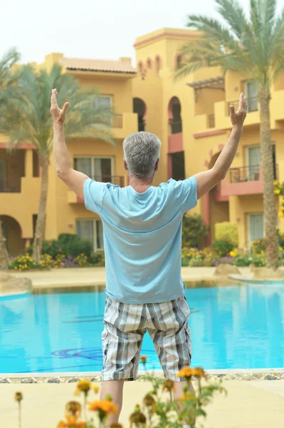 Senior man near pool — Stock Photo, Image