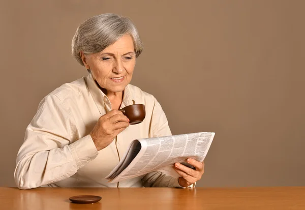 Senior woman with cup — Stock Photo, Image