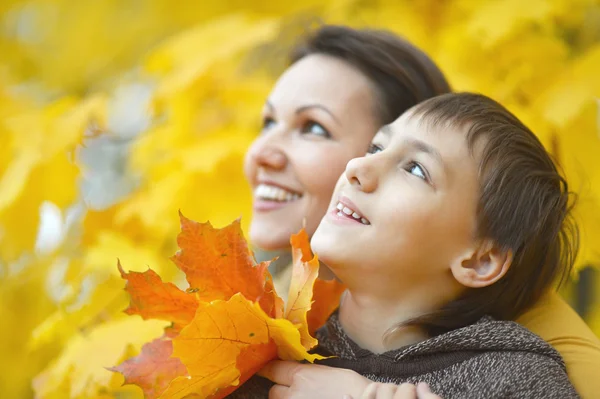 Beautiful mother with son in park — Stock Photo, Image