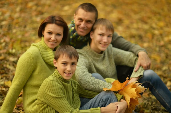 Family in autumn park — Stock Photo, Image