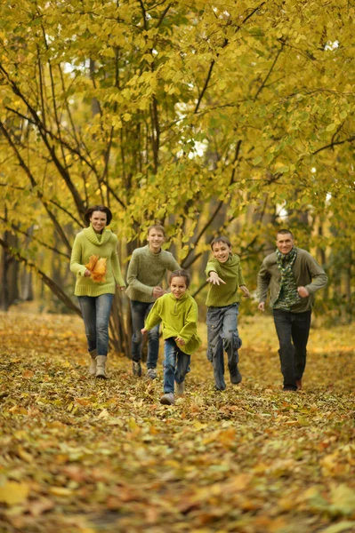 Family in autumn park — Stock Photo, Image