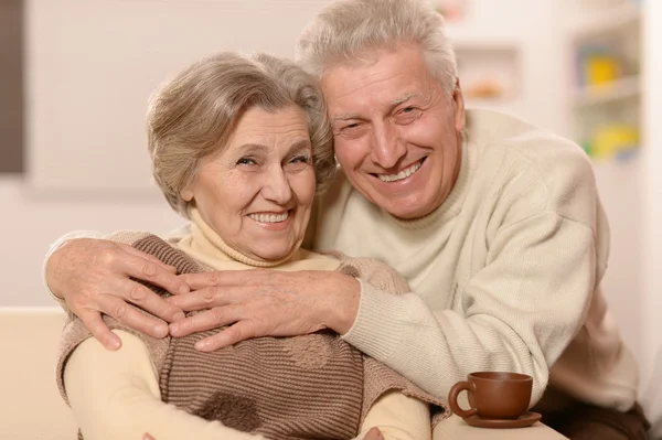 Senior couple with cup of tea Royalty Free Stock Images