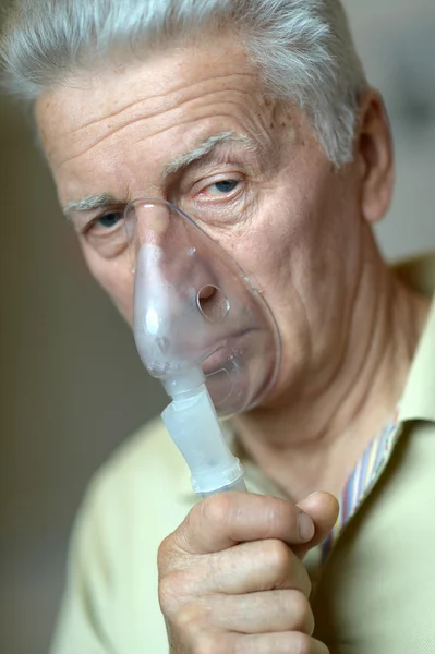 Elderly man with inhalation — Stock Photo, Image