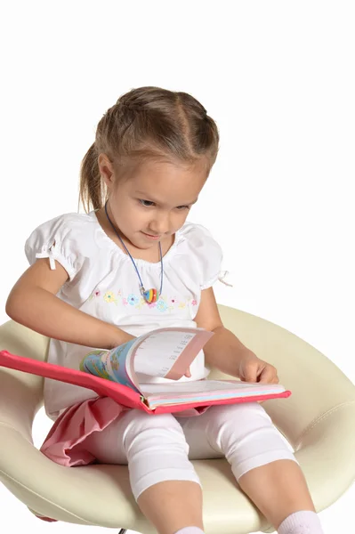 Little girl reading a book — Stock Photo, Image