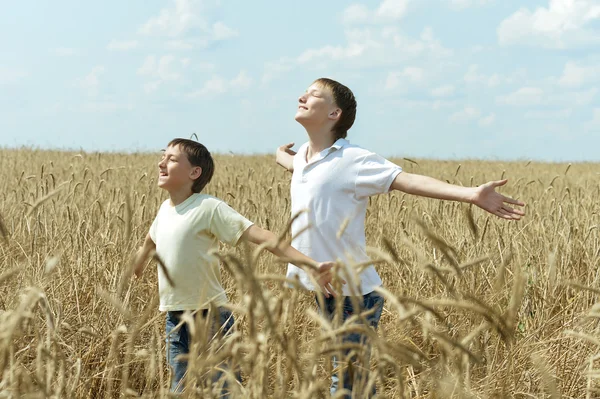 Boys standing at field — Stock Photo, Image