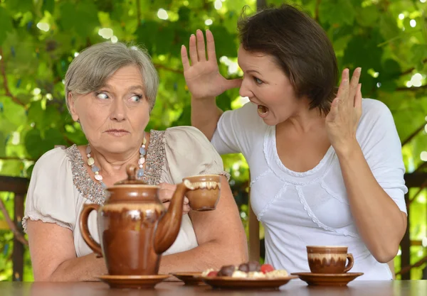 Older woman with  daughter — Stock Photo, Image