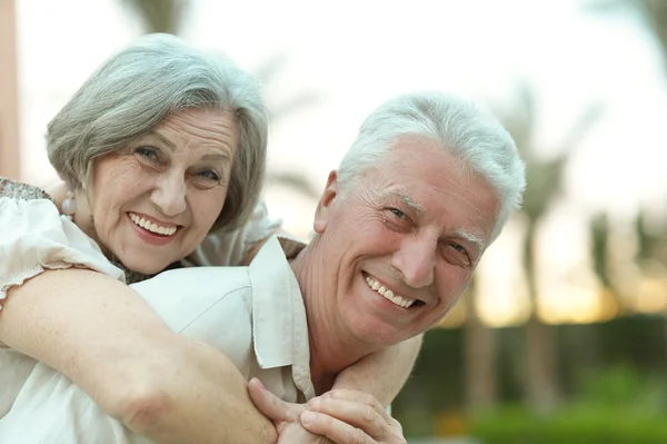 Senior couple resting on resort — Stock Photo, Image