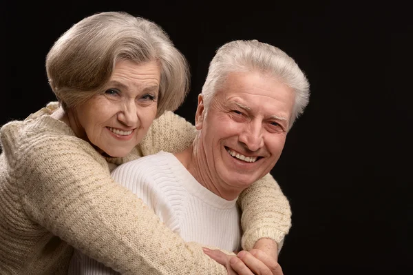 Pareja anciana en negro — Foto de Stock