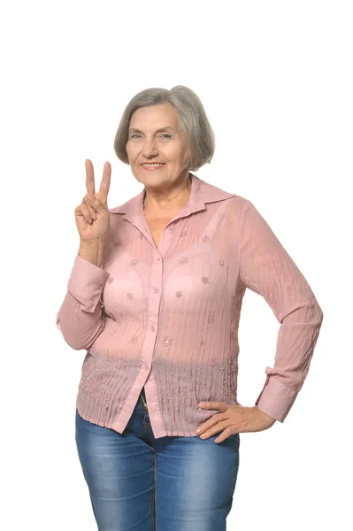 Femme âgée montrer un signe de pièce — Photo