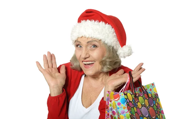 Starší žena s nákupní tašky — Stock fotografie