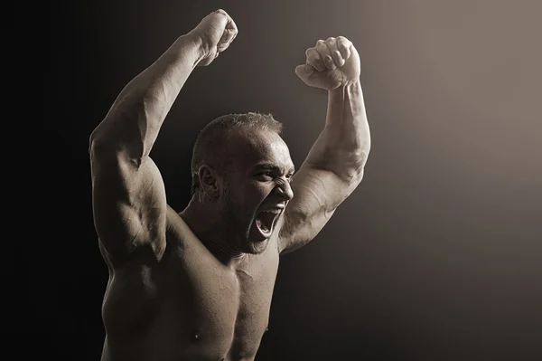 Bodybuilder hands up — Stock Photo, Image