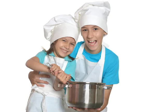 哥哥和妹妹在厨师制服 — 图库照片