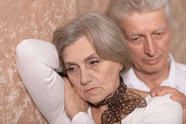 Sad elder couple at home — Stock Photo, Image