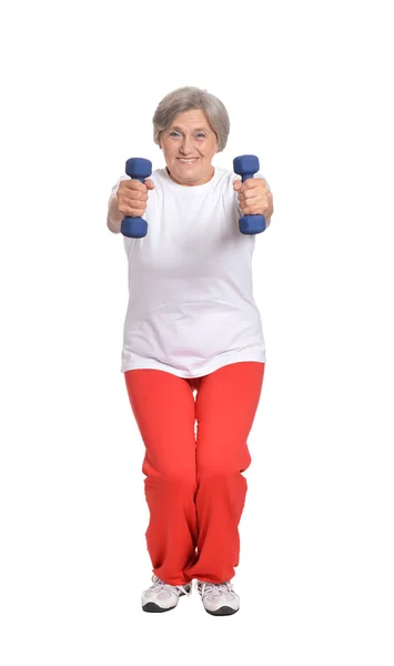 Mature woman  exercising with dumbbells — Stock Photo, Image