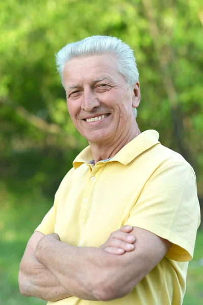 Portrait of old man on nature — Stock Photo, Image