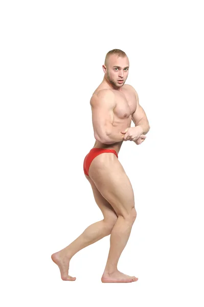 Bodybuilder posing his muscles — Stock Photo, Image