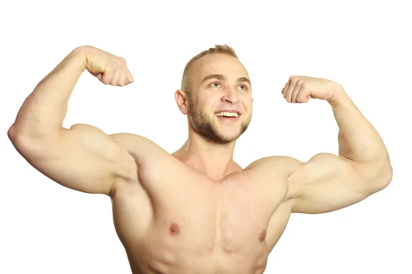 Bodybuilder posiert seine Muskeln — Stockfoto