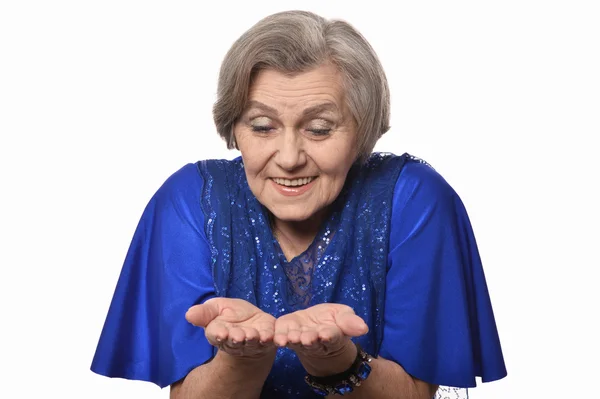 Older woman showing your product — Stock Photo, Image