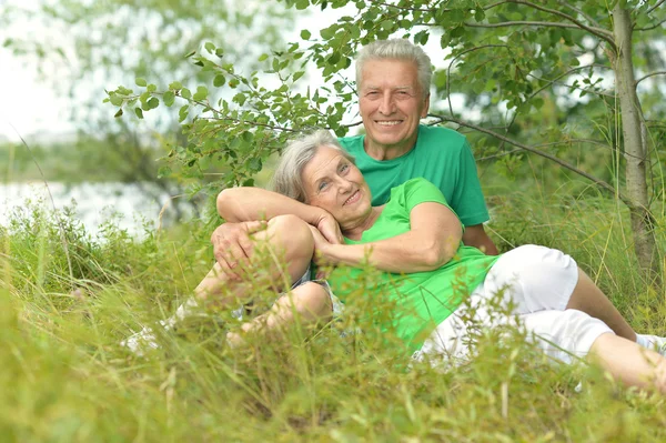 Elderly couple in nature — Stock Photo, Image