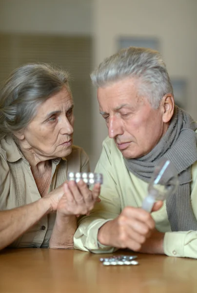 Portrait of ill senior couple — Stock Photo, Image