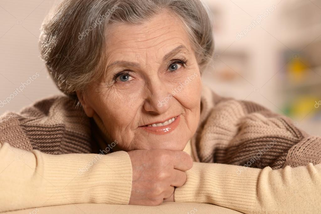 Old lady is resting at home — Stock Photo © aletia 59850731