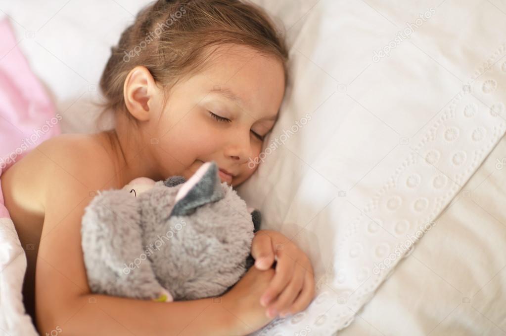 Little girl sleeping Stock Photo by ©aletia 59852521