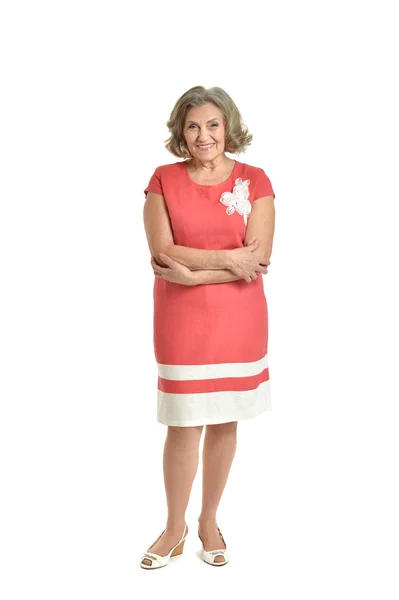 Senior kvinna i röd klänning — Stockfoto