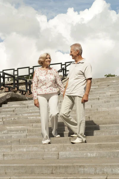 Elderly couple on walk — Stock Photo, Image