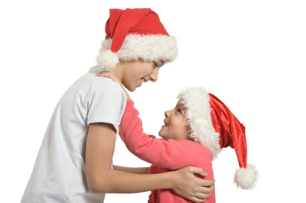 Children in in Christmas hats — Stock Photo, Image