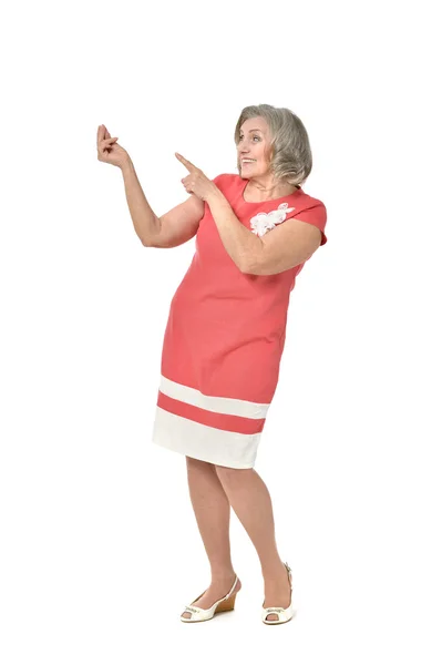Senior kvinne som peker – stockfoto