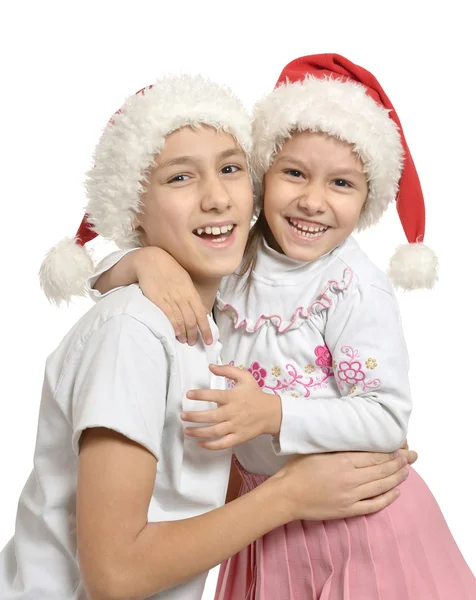 Niños en sombreros de Navidad — Foto de Stock