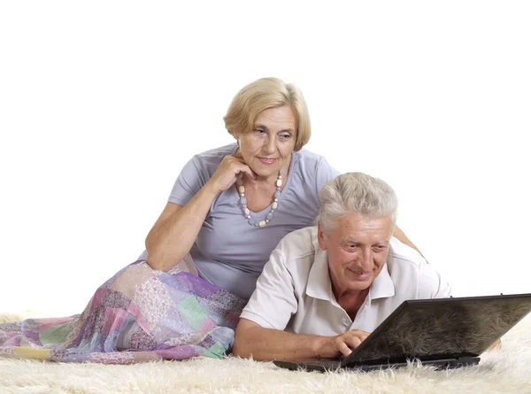 Mature couple  with laptop — Stock Photo, Image