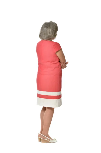 Senior woman in red dress — Stock Photo, Image