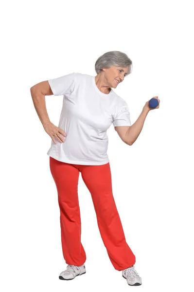 Senior woman exercising with dumbbells — Stock Photo, Image