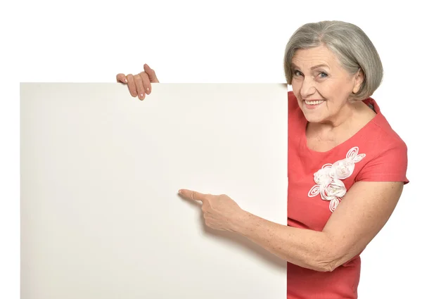 Senior woman with  poster — Stock Photo, Image