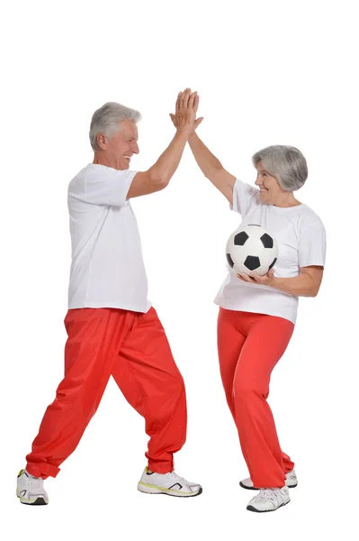 Pareja mayor haciendo ejercicio con pelota —  Fotos de Stock