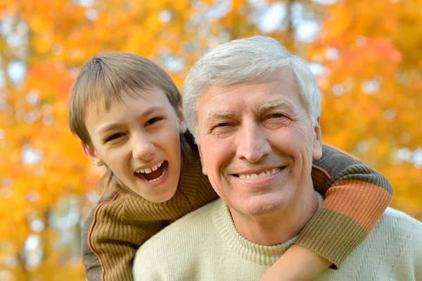 Grandfather and grandson  in park — Stock Photo, Image