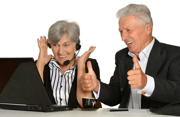 Mature couple in  workplace — Stock Photo, Image