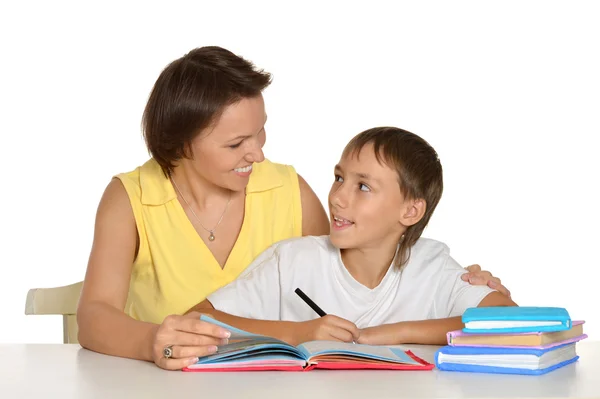 Mother and son doing homework — Stock Photo, Image