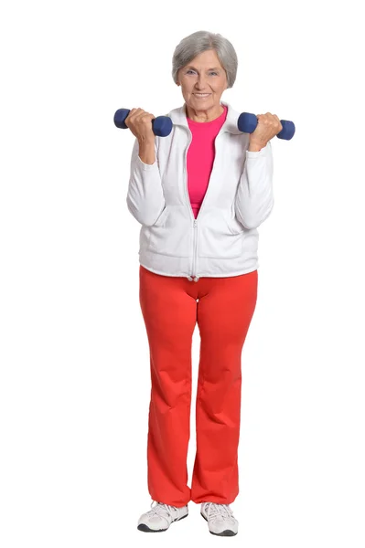 Senior woman exercising with dumbbells — Stock Photo, Image